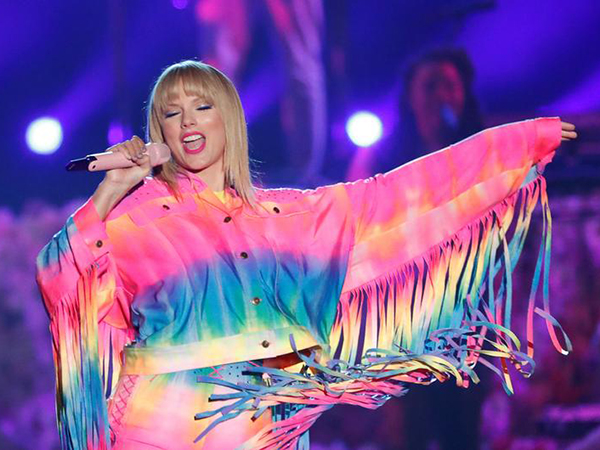 Taylor Swift likens herself to Hillary Clinton as she explains why she was silent on politics