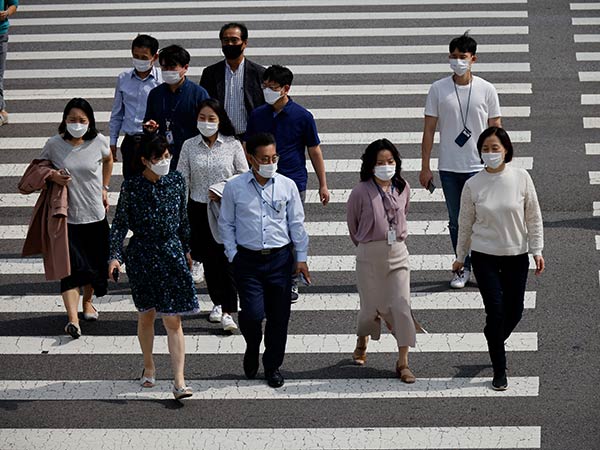 New virus cases smallest since early August, upcoming holiday crucial for virus fight