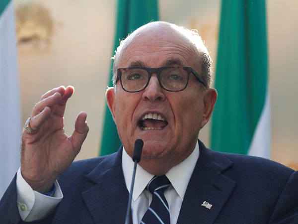 Giuliani associates arrested while trying to board international flight with one-way tickets, prosecutors say
