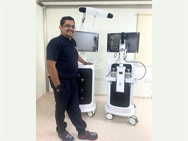 Dr Rohit Damor with Velys Robot
