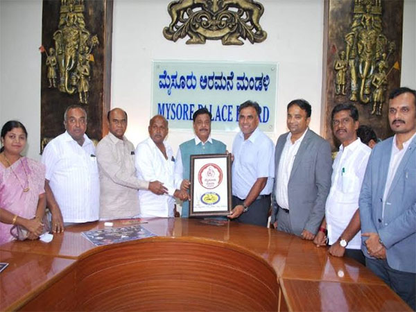 Dr H.C. Mahadevappa, Minister for Social Welfare, and Arjun Ranga, MD of Cycle Pure Agarbathi, revealed Mysuru Dasara's new logo