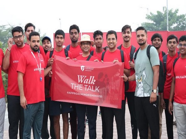 Shobhit Mathur, Co-Founder and Vice Chancellor of Rishihood University, stands alongside students for walkathon event