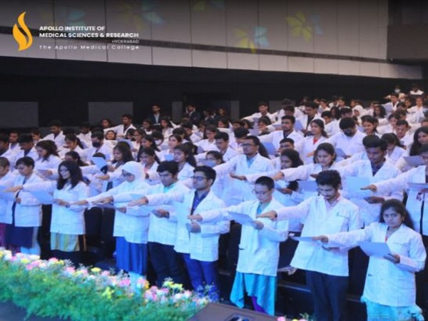 Future doctors taking oath during white coat ceremony at AIMSR, Hyderabad