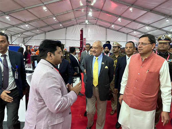 Hitesh M Patel, Promoter & Director, Instashield with Honorable Chief Minister of Uttarakhand Pushkar Singh Dhami at World Congress on Disaster Management (WCDM) in Dehradun