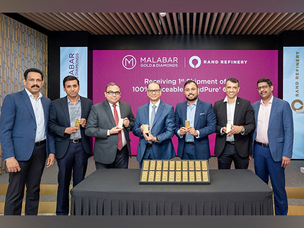 Malabar Gold & Diamonds' Shamlal Ahamed, MD - International Operations, receives the inaugural batch of 'RandPure' gold from Rand Refinery's CEO Praveen Baijnath and CFO Dean Subramanian