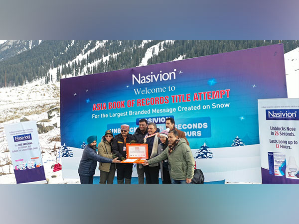 Seen here team Nasivion along with the team from Asia Book of Records celebrating the Largest Branded Message created on Snow in Sonmarg