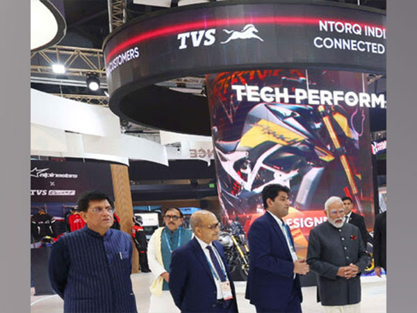 Prime Minister Narendra Modi, Piyush Goyal - Minister of Commerce, Sudarshan Venu, MD, TVS Motor Company at TVS Motor Pavilion at Bharat Mobility Global Expo 2024.  Photo Credit: PMO