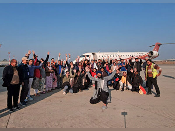 Devotees along with the crew of Trip To Temples before embarking on first aerial darshan of Mount Kailash and Mansarovar Lake.