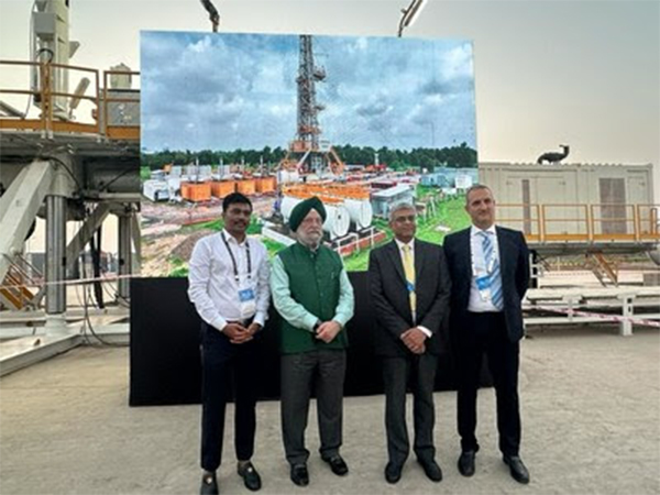 From Left: MEIL Managing Director, P.V. Krishna Reddy, along with the Union Minister for Petroleum & Natural Gas, Hardeep Singh Puri, and other officials