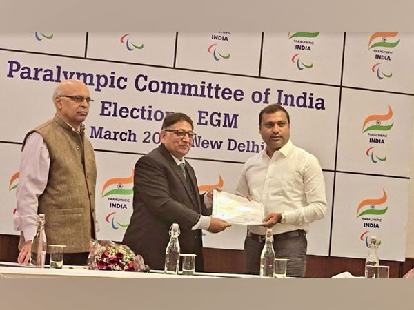 Engineer Chandrasekar proudly accepts his certificate from the Electoral Officer as he assumes the esteemed role of Vice-President of the Paralympic Committee of India (PCI) in New Delhi
