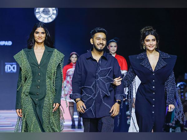 INIFD Borivali Fashion Design Student Yash Gada with Karishma Tanna at the Lakme Fashion Week 2024 with his "Dhagedaar Denim" Collection