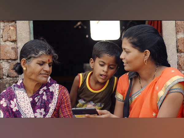 A Digital Sakhi imparting modules during a home visit under Digital Financial Inclusion
