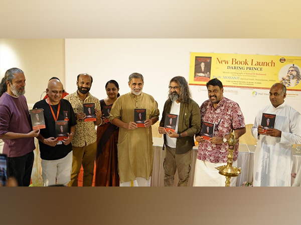 Dr.Mohanji, spiritual guru and childhood friend of Kamal H Muhamed, presents the first copy of "Daring Prince" to former diplomat VenuRajamony IFS (rtd.) in Kochi on Saturday, March 23rd.