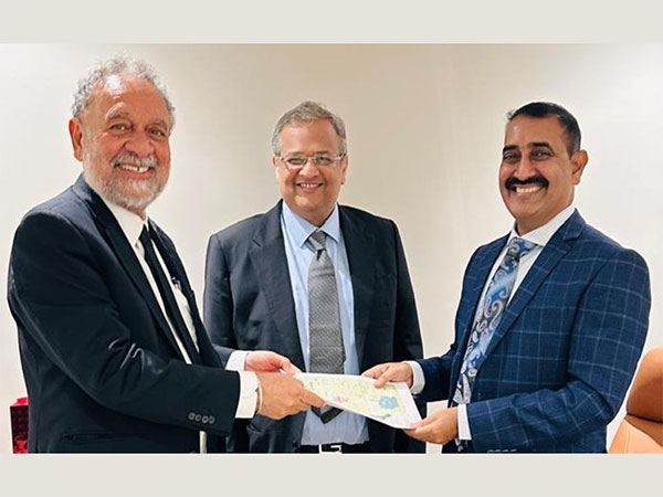 Handover of asset documents from Tan to Greta Minerals MD Rajshekhar, observed by Greta Group Chairman Nitesh Chaudhari