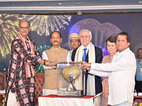 Governor of Odisha, Raghubar Das, Deputy CM Odisha, K. V. Singhdeo, and Founder KIIT & KISS, Dr Achyuta Samanta presenting the Award to Dr Ary S. Graca, President FIVB