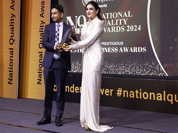 Dwarkesh Bhartiye receiving Brand Empower's "National Quality Award 2024" from Padma Shree Awardee, Raveena Tandon