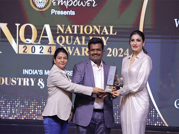 Omkar Ghate (Managing Director), Rohini Narvekar (Director) receiving Brand Empower's "National Quality Award 2024" from Padma Shree Awardee, Raveena Tandon.