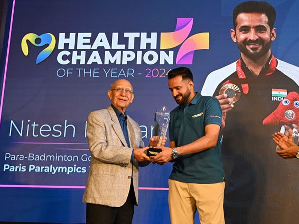 Happiest Health, Chairman, Ashok Soota felicitates Paris 2024 Paralympic Badminton Gold Medalist - Nitesh Kumar as the Happiest Health Champion of 2024