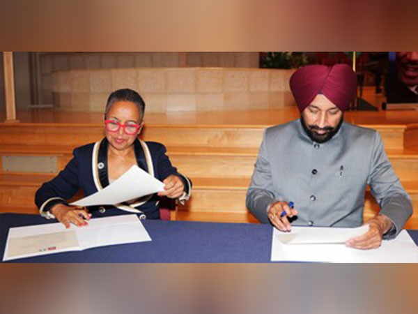 Rajya Sabha MP & Chancellor Chandigarh University Satnam Singh Sandhu signing MoU with Dr Cheryl H. Kisunzu, Provost, Washington Adventist University at University campus Washington, USA