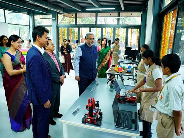 Bala Venkatesh Varma, Praveen Raju, and other dignitaries admire student innovations at the state-of-the-art Maker's Space Lab inauguration