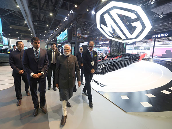 PM Narendra Modi visits JSW MG Motor India's pavillion at the BMGE 2025. Parth Jindal, Director, JSW MG Motor India and Rajeev Chaba, CEO Emeritus, JSW MG Motor India were with him