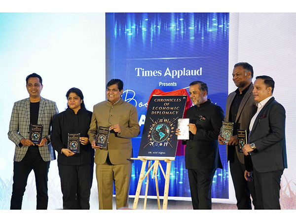 Dr. Asif Iqbal Launches 'Chronicles of Economic Diplomacy' in Mumbai, Unveiled by Chetan Bhagat