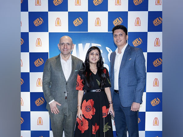 Antonio Bautista (left), Shreya Malpani (center), and Jai Malpani (right), from the team of Dave & Buster's India team at the Grand Opening Party