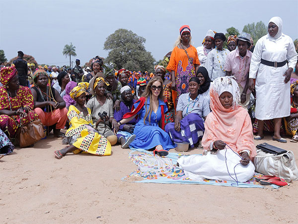 Senator Dr. Rasha Kelej, CEO of Merck Foundation with infertile women in The Gambia