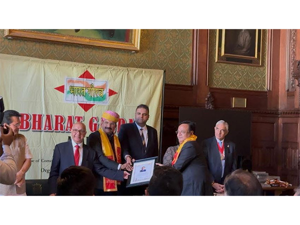Pt. Suresh Mishra, President, Bharat Gaurav Award, confers the award to Mr. Pravin Chandan at British Parliament, with MP Virendra Sharma and ex-Mayor Sunil Chopra