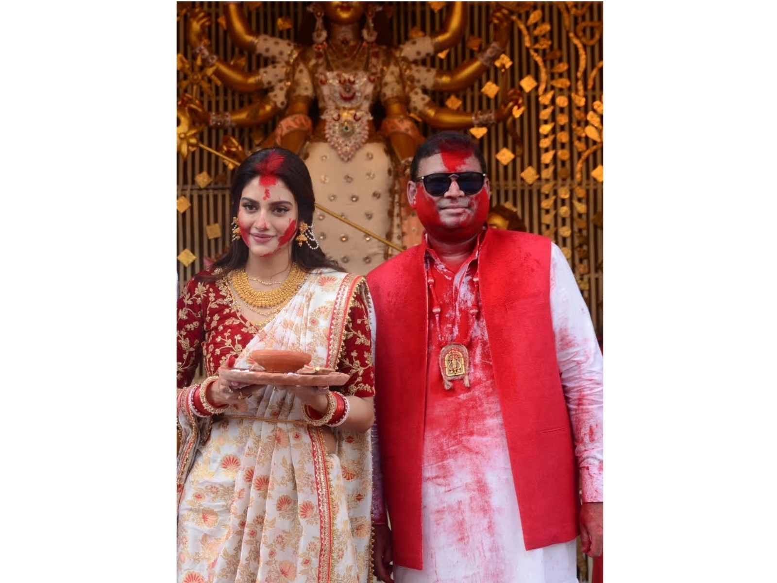 A file picture of Nusrat Jahan at Chaltabagan Sindoor Khela with Sundeep Bhutoria, Chairman, Manicktala Chaltabagan Lohapatty Durga Puja Committee