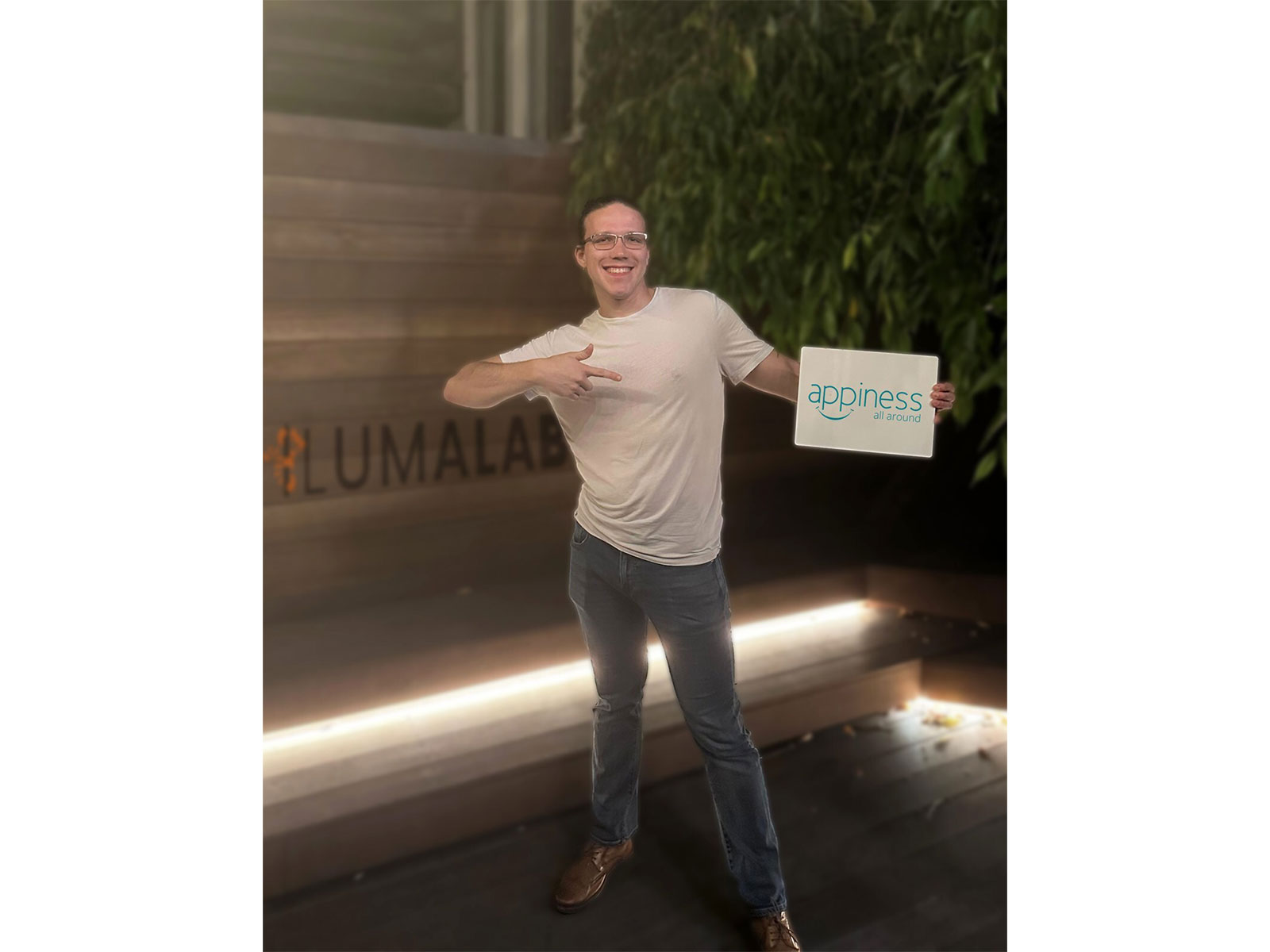 Patrik Slachta, Founder, iLumaLab holding the logo of Appiness