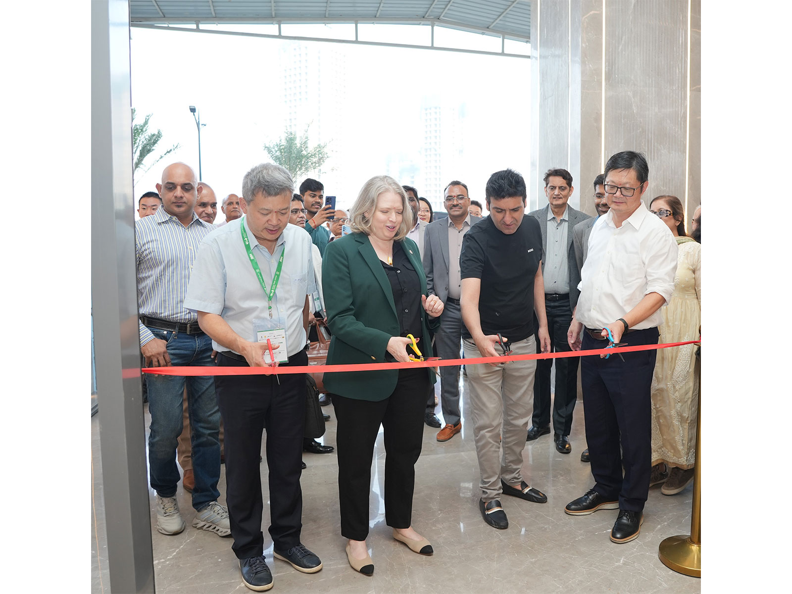 From L to R: Mr. Peter Yep, Ms. Crystal Edn, Mr. Ashish Raheja, Mr. Scott Wang, unveiling the Grand lobby of Prime at WTC Navi Mumbai at Raheja District