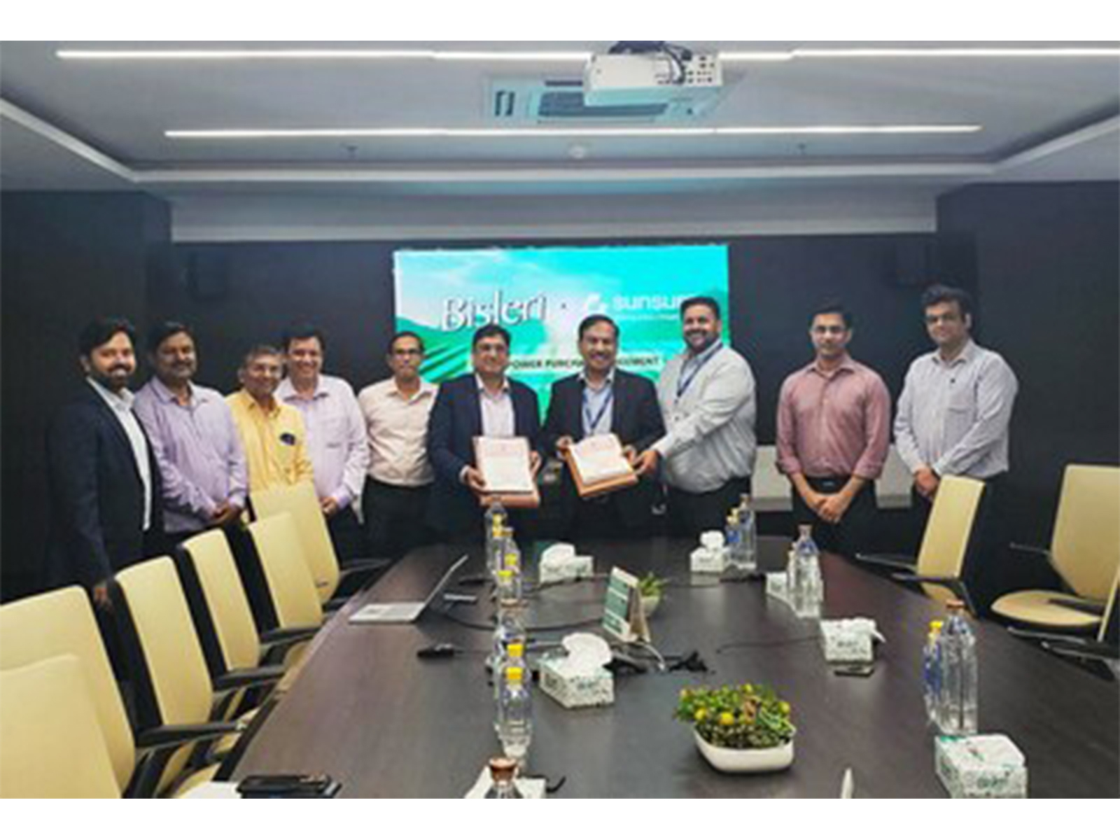 Representatives from Sunsure Energy and Bisleri International at Bisleri's Mumbai Office