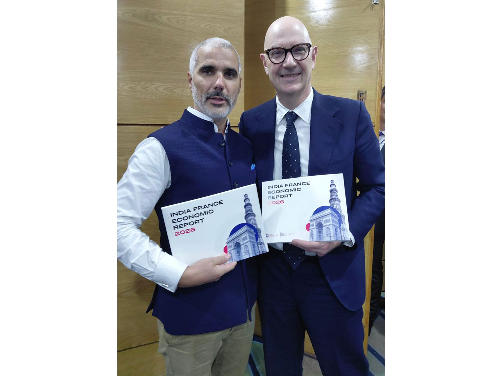French Minister Mr. Roland Lescure with IFCCI President Mr. Jean Touboul holding the India-France Economic Report 2026 at the India France CEOs Forum