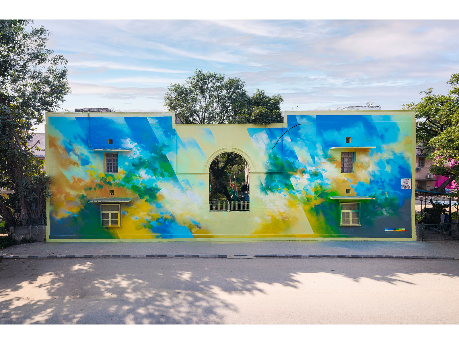 Mural inspired by Asian Paints Colour of the Year 2026 'Moonlit Silk' at the Lodhi Art Festival by artist, Pener