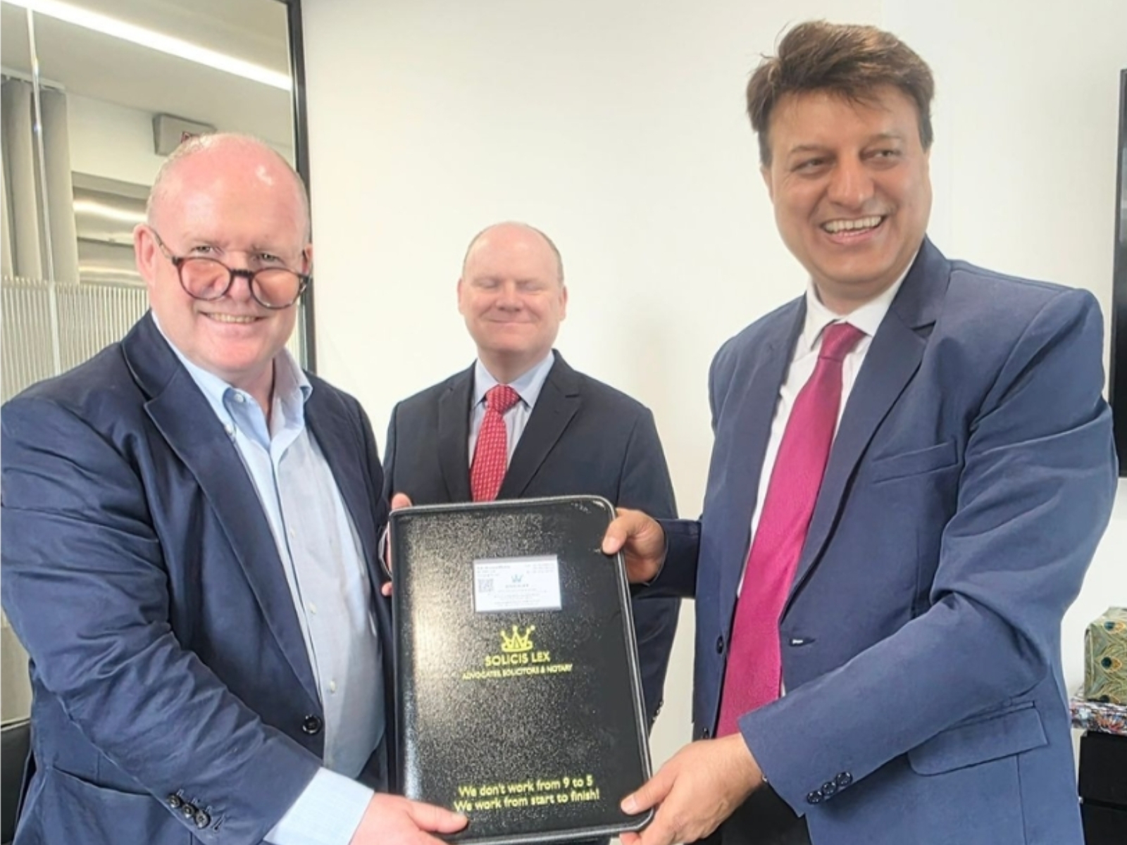 From left to right, Child & Child Managing Partners Adrian Biles & Robert Biles and SolicisLex Managing Partner Ameet Mehta.