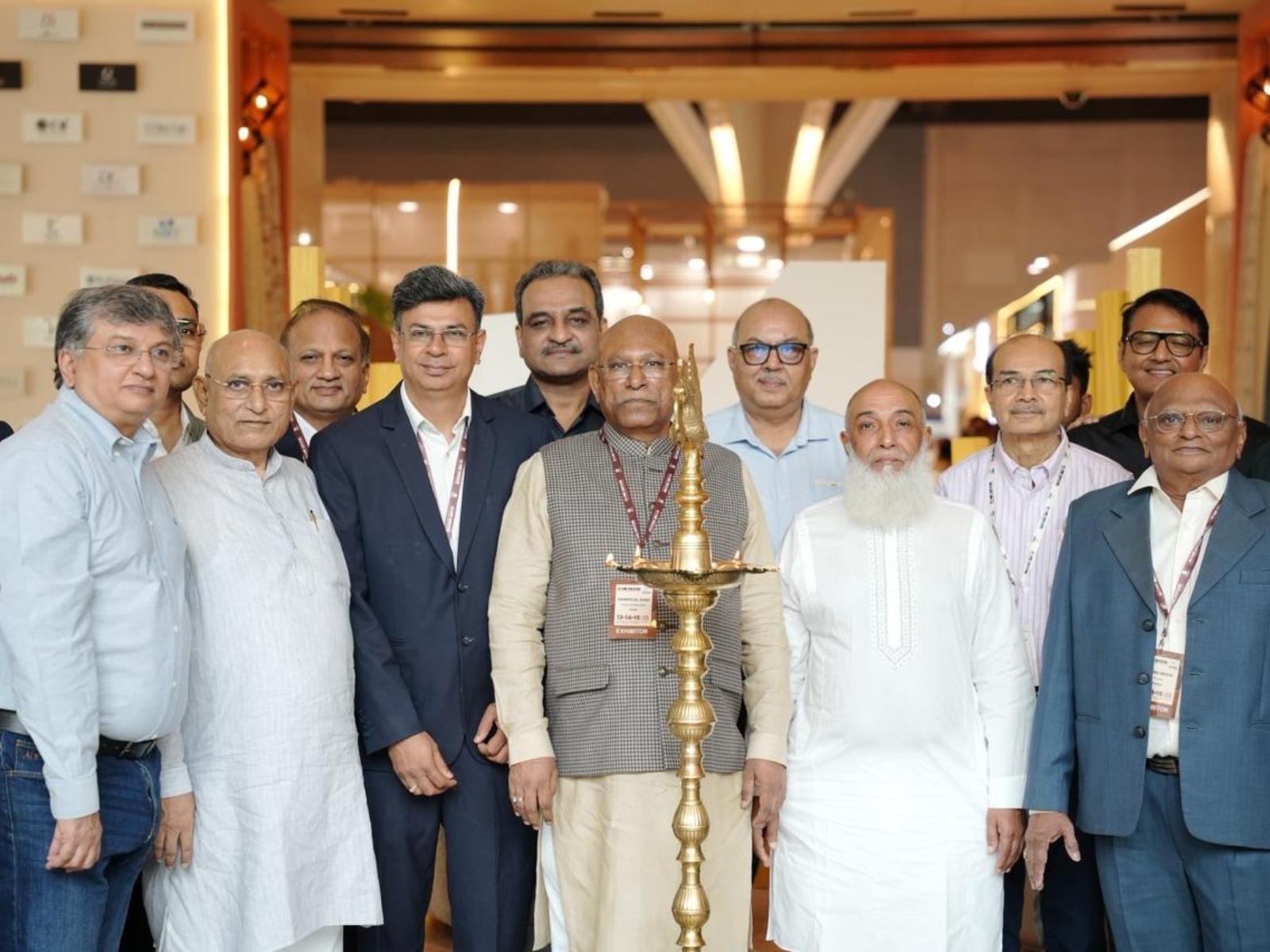 Chirag Dinesh Mehta, President of the Association of Home Textile seen with Shantilal Shah, Chairman along with the exhibitors and visitors during the inauguration