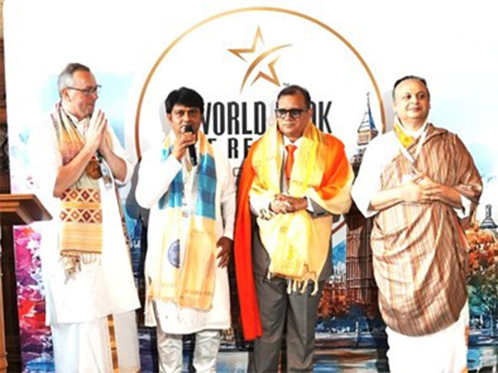 CEO Santosh Shukla was honored by Shri Rajrajeshwar Guruji and Shri Goswami Ji at the 10th UK Parliament Summit of the World Book of Records
