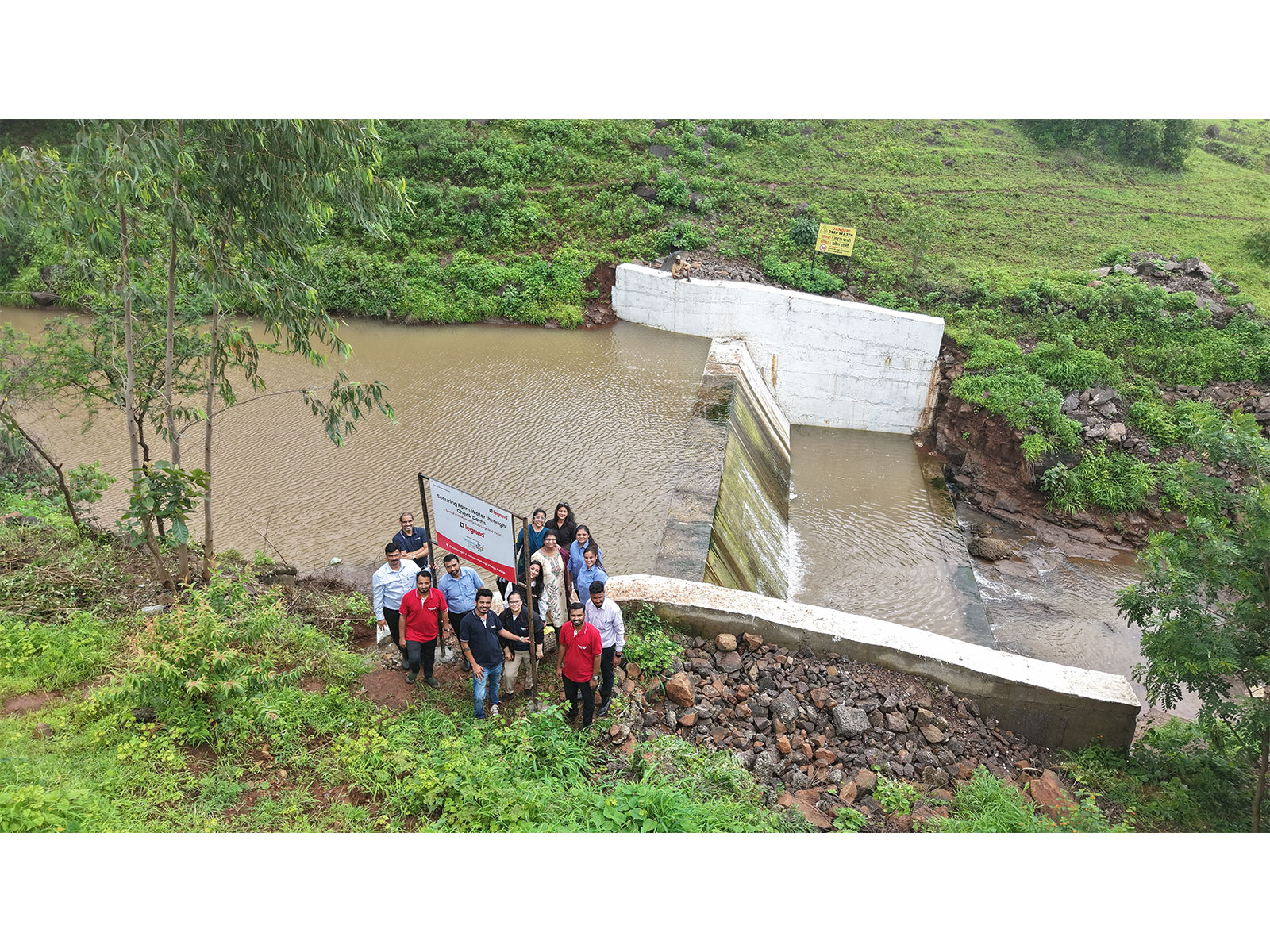 Group Legrand India representatives at the newly completed Shastrinagar Check Dam, Nashik