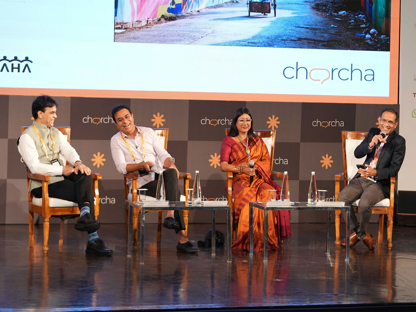 Cross-party leaders engage in a dialogue on urban development at charcha 2026