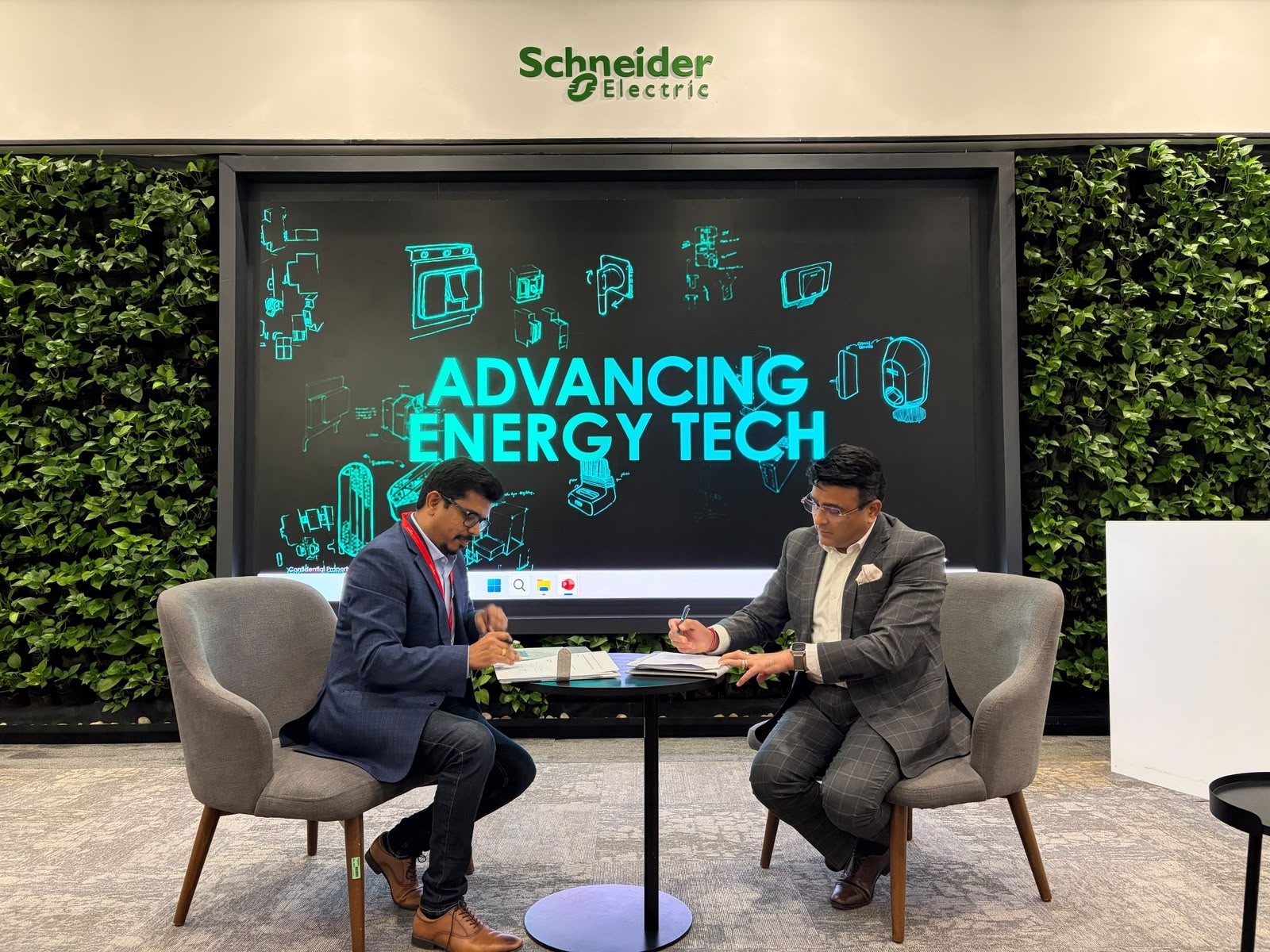 Mr. Sujith Nair_ Networks for Humanity & Mr. Deepak Sharma_ Schneider Electric India, signing the MoU