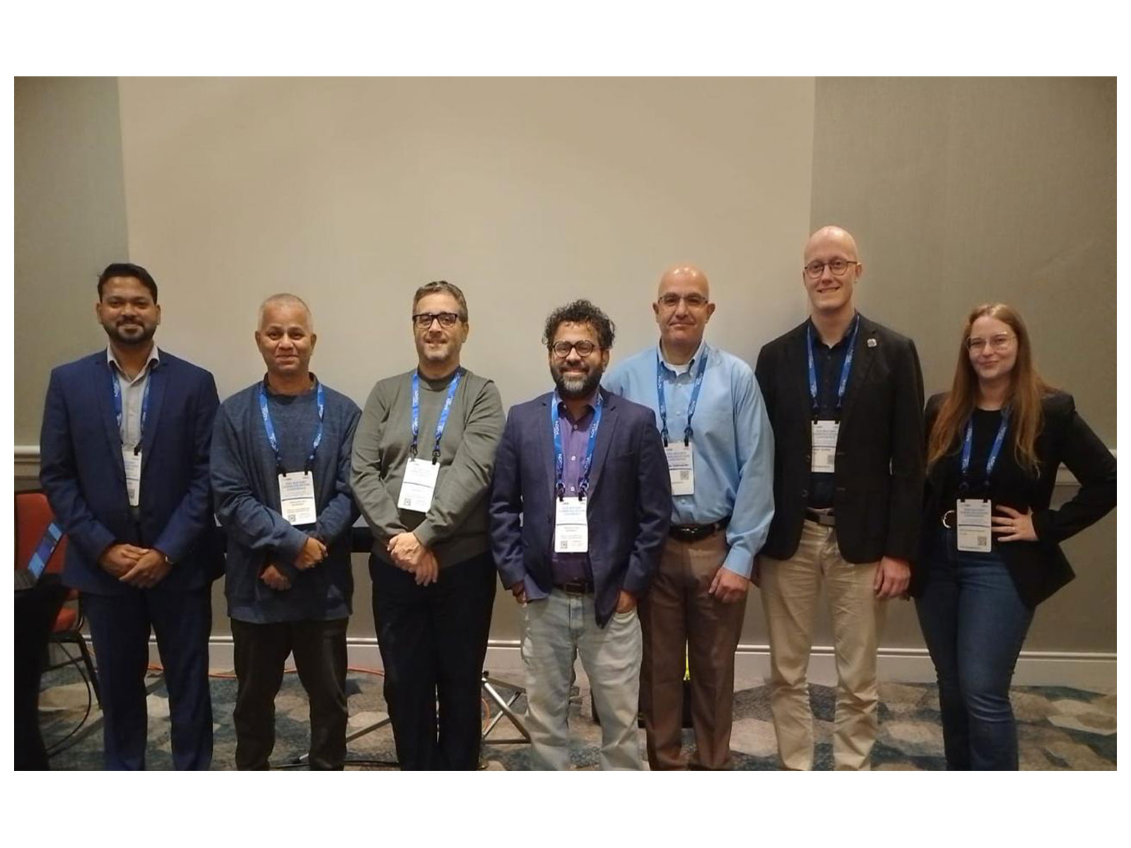 Dr. Shivaraman Ramaswamy (centre) with attendees at QuantEW 2026, organized by BBBS at IEEE MILCOM 2026