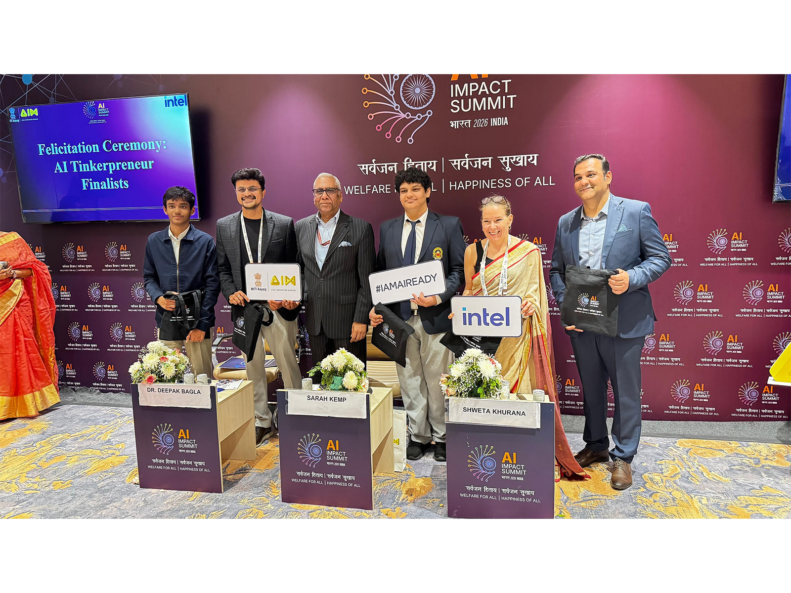 Adhiraj Chauhan (center) with Deepak Bagla, Mission Director of AIM at NITI Aayog (left) and Sarah Kemp (right), VP, International Govt Affairs, Intel, at the AI Impact Summit 2026