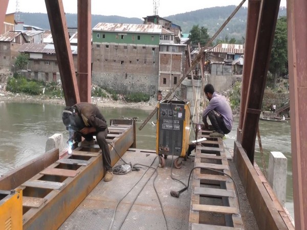 Re-construction of battered wooden footbridge in Baramulla all set to complete