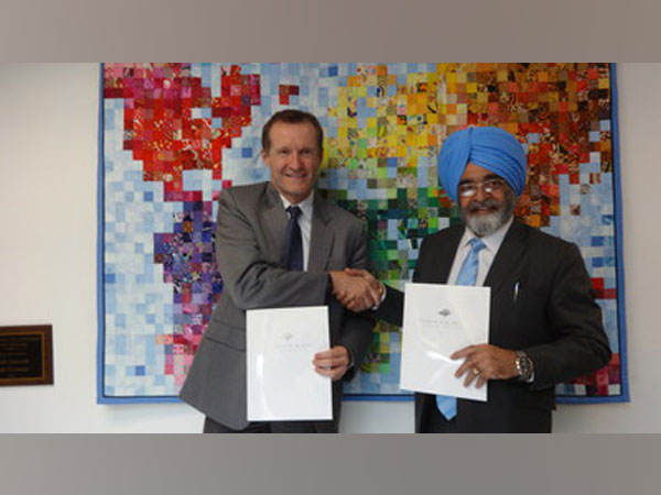 University official of Vancouver Island University British Columbia (Canada) and Chandigarh University Pro-Chancellor exchanging the academic MoU