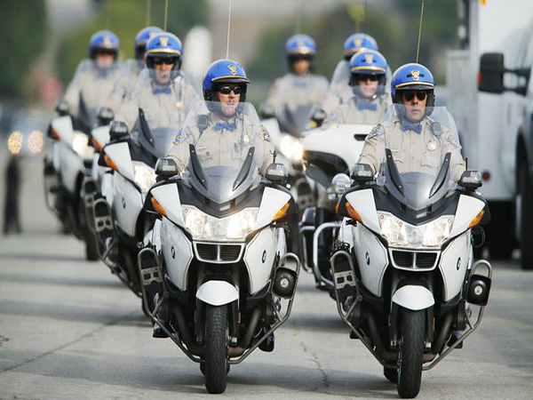 California motorcycle officer involved in crash dies