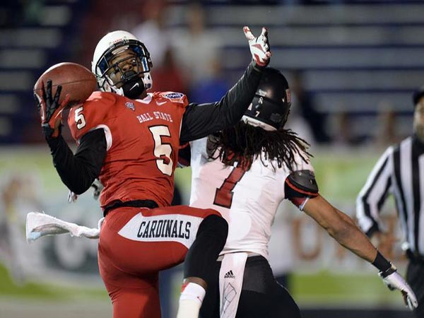 Police release video of suspected intruder in former NFL star's slaying