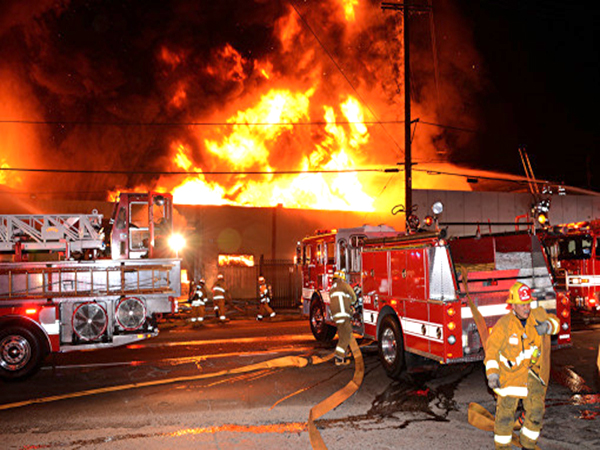 Over 130 firefighters work to extinguish large structural fire in downtown Los Angeles