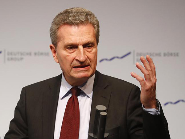 EU boss urges CRACKDOWN on France: Oettinger calls for bloc to sanction Macron over budget