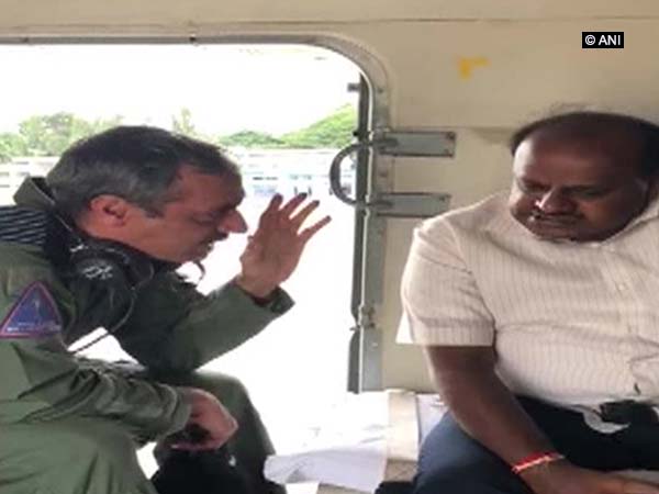 K'taka CM conducts aerial survey of flood, landslide affected areas